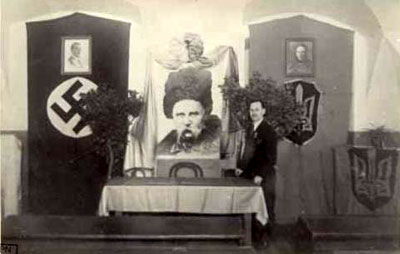 Godła Niemiec i Ukrainy w środku zdjęcie ukraińskiego poety Tarasa Szewczenki